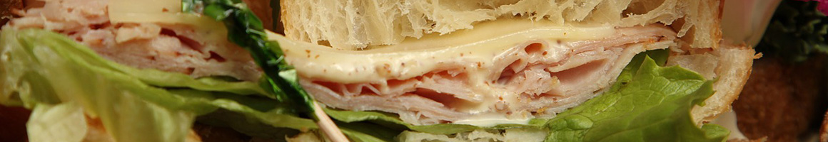 Eating Sandwich at Pickle Barrel restaurant in Bozeman, MT.